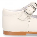 Nappa leather Little Classic T-Strap style shoes with perforated design.