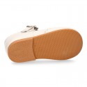 Nappa leather Little Classic T-Strap style shoes with perforated design.