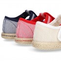 Stripes print Cotton canvas T-Strap espadrille shoes with hook and loop strap.