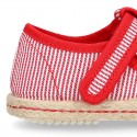 Stripes print Cotton canvas T-Strap espadrille shoes with hook and loop strap.