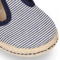 Stripes print Cotton canvas T-Strap espadrille shoes with hook and loop strap.