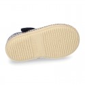 Stripes print Cotton canvas T-Strap espadrille shoes with hook and loop strap.