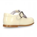 Patent leather little T-Strap shoes with buckle fastening in PASTEL colors.