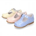 Patent leather little T-Strap shoes with buckle fastening in PASTEL colors.