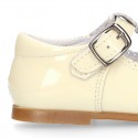 Patent leather little T-Strap shoes with buckle fastening in PASTEL colors.