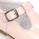 Patent leather little T-Strap shoes with buckle fastening in PASTEL colors.