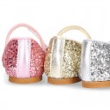 GLITTER classic Mary Jane shoes with hook and loop strap and button.