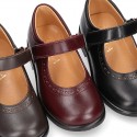 School Classic girl Nappa leather little Mary Jane shoes with perforated design and hook and loop strap.