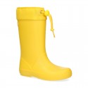 School rain boot shoes with adjustable neck.