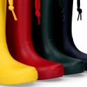 School rain boot shoes with adjustable neck.