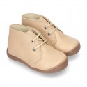 Ankle boot shoes for first steps with laces closure, toe cap and counter in EXTRA SOFT leather.