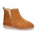 Suede leather kids ankle boot shoes with golden elastic band and zipper closure.