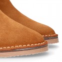 Suede leather kids ankle boot shoes with golden elastic band and zipper closure.