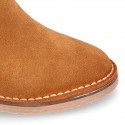 Suede leather kids ankle boot shoes with golden elastic band and zipper closure.