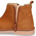 Suede leather kids ankle boot shoes with golden elastic band and zipper closure.