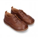 Nappa leather kids Laces up shoes with perforated design.