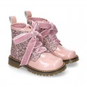 ROCK style patent leather kids boots with GLITTER and velvet ties closure.