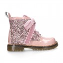 ROCK style patent leather kids boots with GLITTER and velvet ties closure.