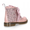 ROCK style patent leather kids boots with GLITTER and velvet ties closure.