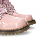 ROCK style patent leather kids boots with GLITTER and velvet ties closure.