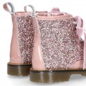 ROCK style patent leather kids boots with GLITTER and velvet ties closure.