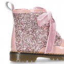 ROCK style patent leather kids boots with GLITTER and velvet ties closure.