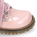 ROCK style patent leather kids boots with GLITTER and velvet ties closure.