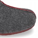 Wool effect Home shoes with clog design and color stitchings for large sizes.