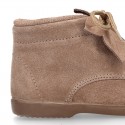 LEAF design Booties with shoelaces closure in suede leather for kids.