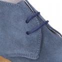 Classic suede leather ankle boots to dress for first steps.