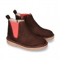 Kids ankle boots with rose elastic band and side zipper closure in suede leather.