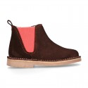 Kids ankle boots with rose elastic band and side zipper closure in suede leather.