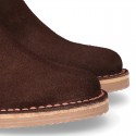 Kids ankle boots with rose elastic band and side zipper closure in suede leather.