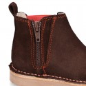 Kids ankle boots with rose elastic band and side zipper closure in suede leather.