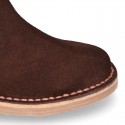 Kids ankle boots with rose elastic band and side zipper closure in suede leather.