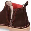 Kids ankle boots with rose elastic band and side zipper closure in suede leather.