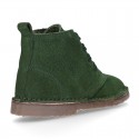 Suede leather kids ankle boots with fake hair lined.