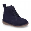 Suede leather kids ankle boots with fake hair lined.