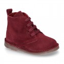 Suede leather kids ankle boots with fake hair lined.