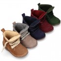 Suede leather kids ankle boots with fake hair lined.