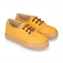 Autumn winter canvas OKAA kids tennis shoes to dress with shoelaces closure in seasonal colors.