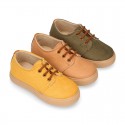 Autumn winter canvas OKAA kids tennis shoes to dress with shoelaces closure in seasonal colors.