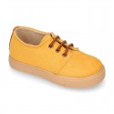 Autumn winter canvas OKAA kids tennis shoes to dress with shoelaces closure in seasonal colors.