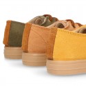 Autumn winter canvas OKAA kids tennis shoes to dress with shoelaces closure in seasonal colors.