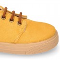 Autumn winter canvas OKAA kids tennis shoes to dress with shoelaces closure in seasonal colors.