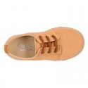 Autumn winter canvas OKAA kids tennis shoes to dress with shoelaces closure in seasonal colors.