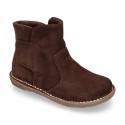 Kids ankle boots with double hook and loop strap closure in suede leather.