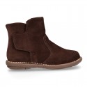 Kids ankle boots with double hook and loop strap closure in suede leather.