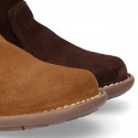 Kids ankle boots with double hook and loop strap closure in suede leather.