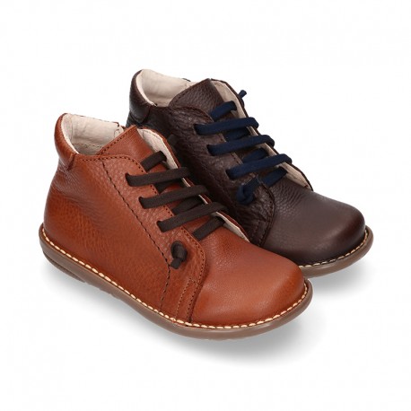 SPORT Kids ankle boots with zipper closure and elastic laces in nappa leather.